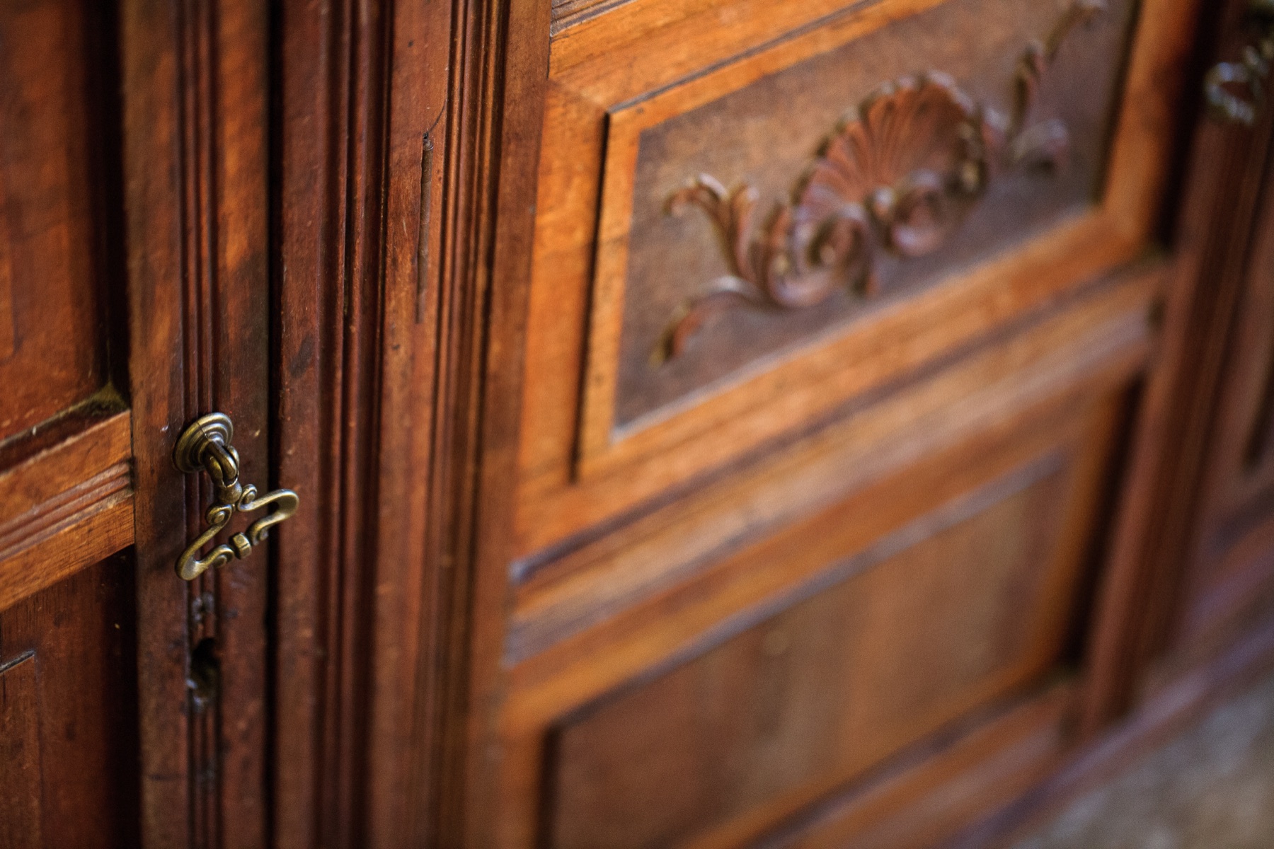 Ornate wooden gun-room door with discreet locking hardware